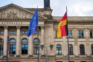 Flags of Germany and European Union against Bundestag building