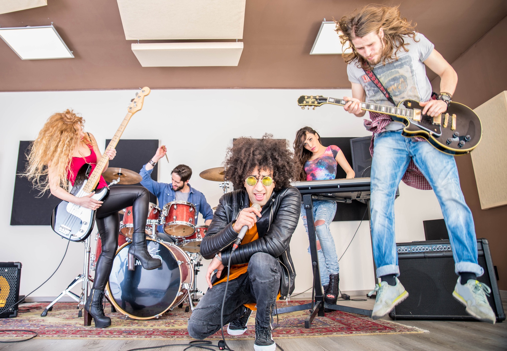 Rock band playing in a recording studio
